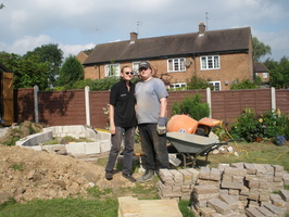 Rachael and Tom in the builders yard back garden